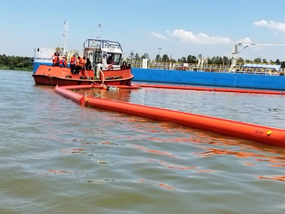 Containment boom deployed on the water during a drill